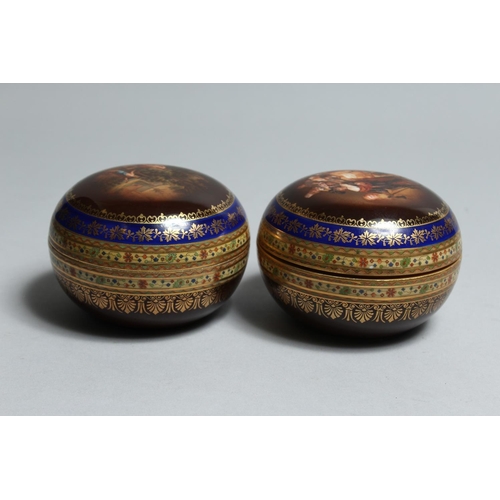 1137 - A PAIR OF VIENNA CIRCULAR PORCELAIN BOXES AND COVERS 3.5ins high.