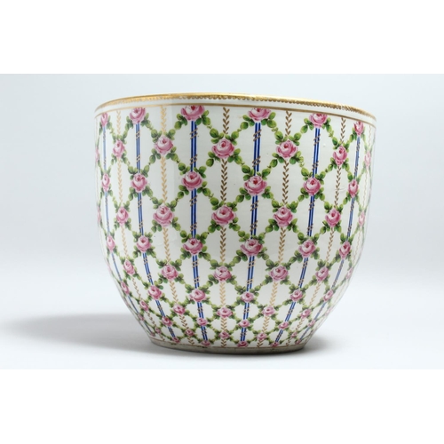 1149 - A GOOD LARGE SEVRES PORCELAIN BOWL OR JARDINIERE, painted with a trellis design with pink roses. 14.... 