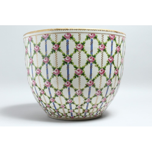 1149 - A GOOD LARGE SEVRES PORCELAIN BOWL OR JARDINIERE, painted with a trellis design with pink roses. 14.... 