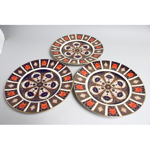 1153 - A SET OF SIX LARGE ROYAL CROWN DERBY OLD  IMARI PATTERN CIRCULAR PLATES, no. 1128. 10.5ins high.