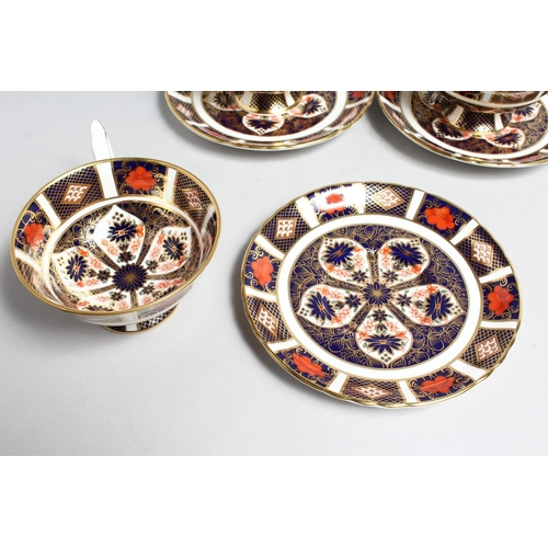 1155 - A SET OF SIX ROYAL CROWN DERBY OLD IMARI PATTERN CUPS AND SIX SAUCERS, NO. 1128.