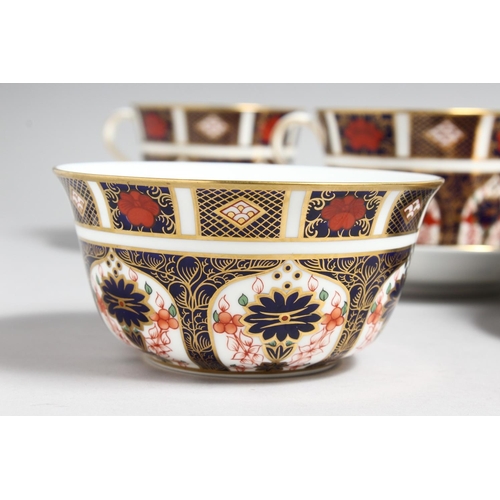 1156 - A SET OF SIX LARGE ROYAL CROWN DERBY OLD IMARI PATTERN CUPS AND SIX SAUCERS, NO. 1128 and a spare cu... 