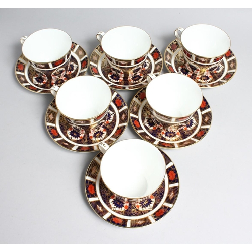 1156 - A SET OF SIX LARGE ROYAL CROWN DERBY OLD IMARI PATTERN CUPS AND SIX SAUCERS, NO. 1128 and a spare cu... 