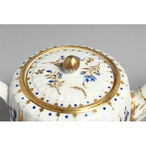 1186 - A CAUGHLEY TEAPOT AND COVER of fluted from painted with dry blue flowers and a CAUGHLEY TEAPOT  AND ... 