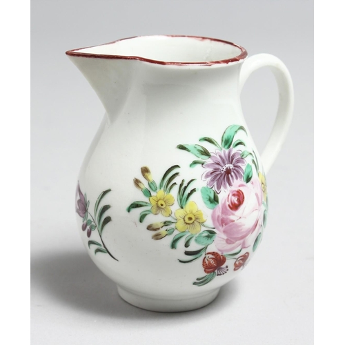 1187 - AN 18TH CENTURY BRISTOL JUG painted with a large floral spray and scattered flowers.