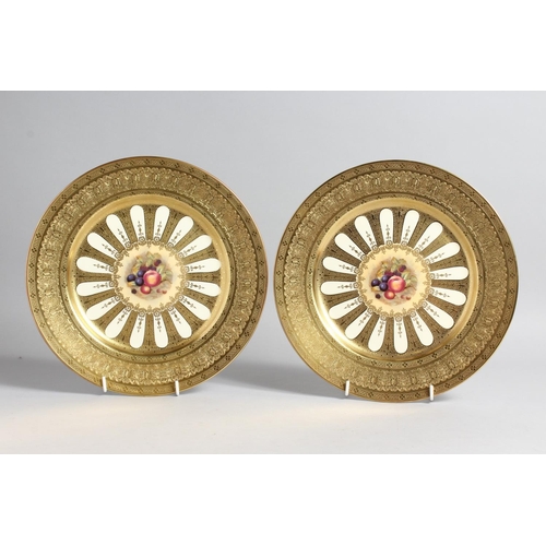 1196 - A GOOD PAIR OF AYNSLEY FRUIT PLATES with gold borders. 10ins diameter.