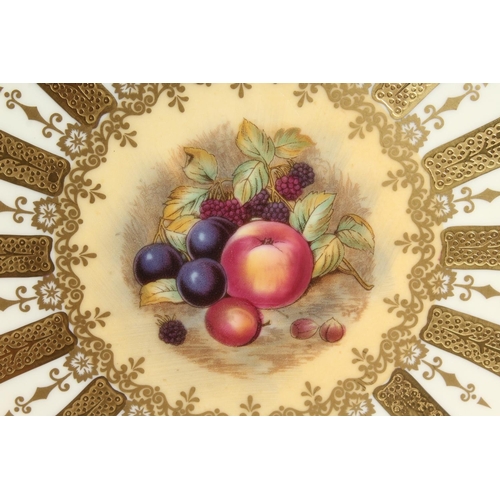 1200 - A GOOD PAIR OF AYNSLEY FRUIT PLATES with gold borders. 10ins diameter