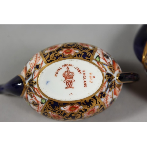 1207 - A MINIATURE CROWN DERBY PART SERVICE comprising teapot, coffee pot, sucrier and milk jug, teapot 3in... 