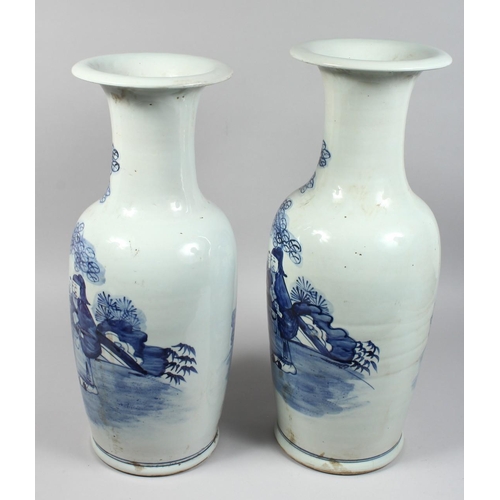 1234 - A LARGE NEAR PAIR OF CHINESE BLUE AND WHITE VASES painted with figures. 22ins & 23ins high.