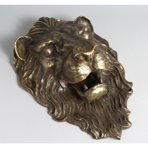 1279 - A CAST BRONZE LION MASK WALL PLAQUE. 18ins high.`