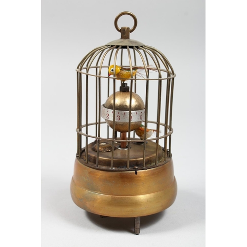 1295 - A NOVELTY BIRD CAGE CLOCK 7ins high.