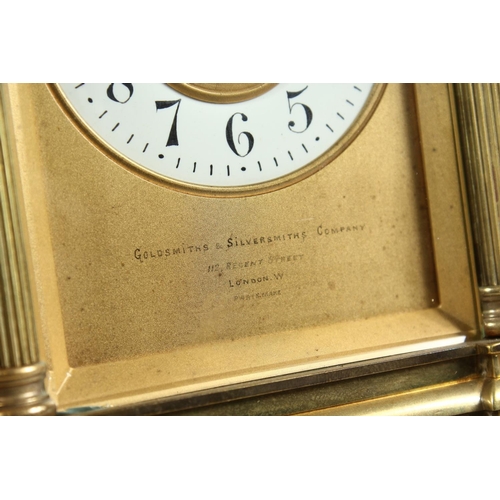 1301 - A GOOD GOLDSMITHS & SILVERSMITHS BRASS CARRIAGE CLOCK with repeat action and column supports. 6ins h... 