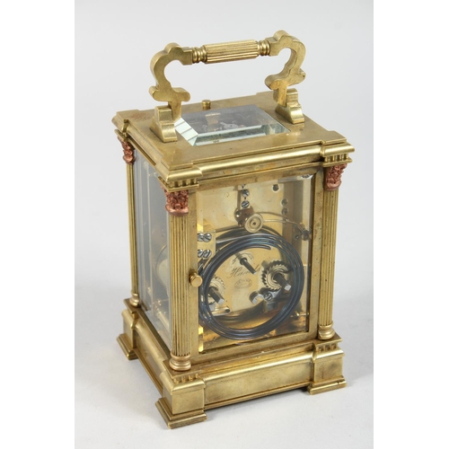 1301 - A GOOD GOLDSMITHS & SILVERSMITHS BRASS CARRIAGE CLOCK with repeat action and column supports. 6ins h... 