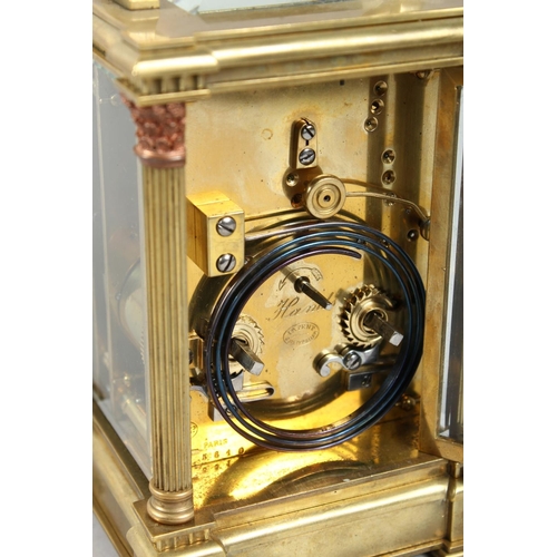 1301 - A GOOD GOLDSMITHS & SILVERSMITHS BRASS CARRIAGE CLOCK with repeat action and column supports. 6ins h... 