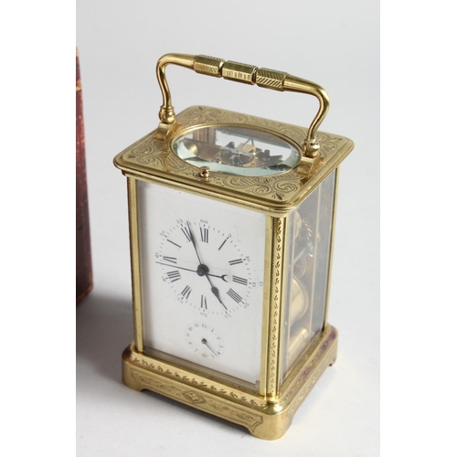 1310 - A GOOD FRENCH ENGRAVED BRASS CARRIAGE CLOCK with eight day movement, striking on a gong, enamel dial... 