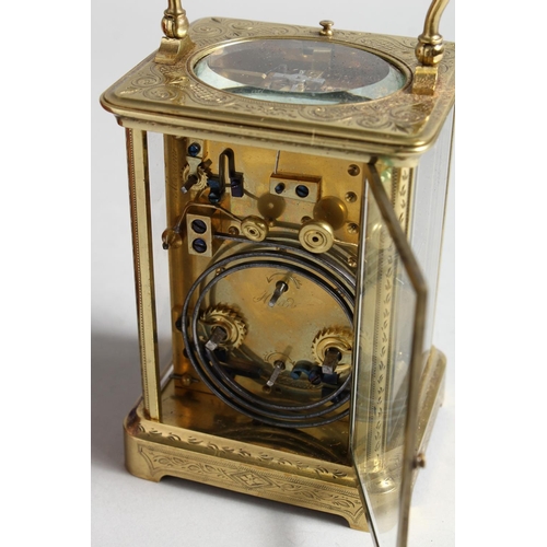 1310 - A GOOD FRENCH ENGRAVED BRASS CARRIAGE CLOCK with eight day movement, striking on a gong, enamel dial... 