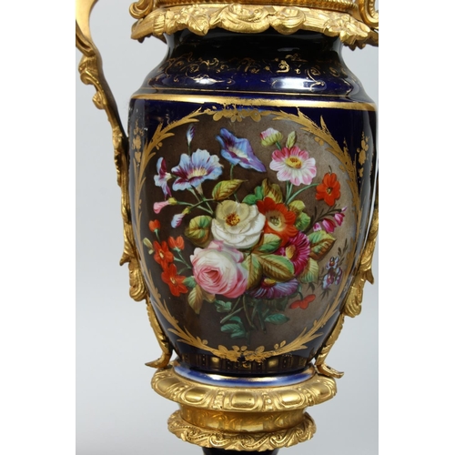 1335 - A PAIR OF PARIS PORCELAIN AND ORMOLU MOUNTED URN SHAPED TABLE LAMPS, painted with panels of flowers ... 