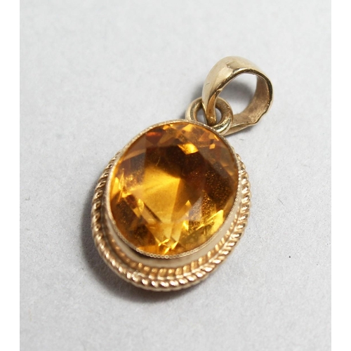 1695 - A 9CT GOLD MOUNTED CITRINE PENDANT