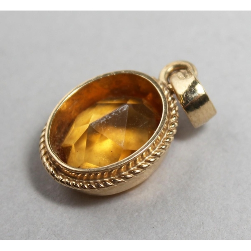 1695 - A 9CT GOLD MOUNTED CITRINE PENDANT