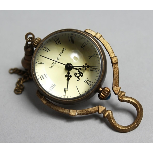 1701 - A SMALL BALL SHAPED PENDANT WATCH