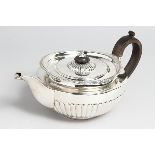 2040 - A GEORGE III SILVER TEA POT by William Burwash London 1818, weighs 24ozs.