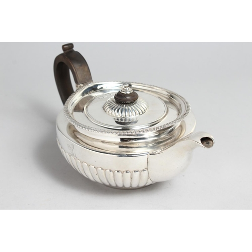 2040 - A GEORGE III SILVER TEA POT by William Burwash London 1818, weighs 24ozs.