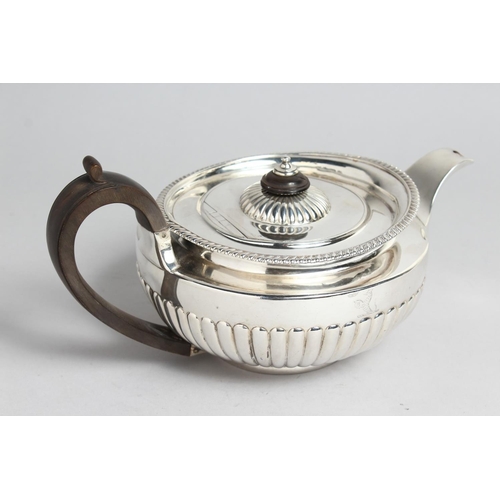 2040 - A GEORGE III SILVER TEA POT by William Burwash London 1818, weighs 24ozs.