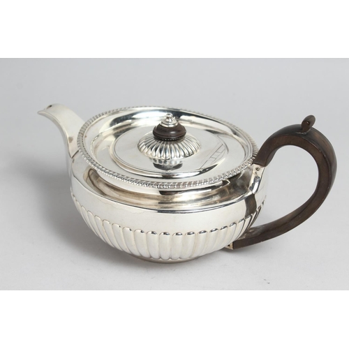 2040 - A GEORGE III SILVER TEA POT by William Burwash London 1818, weighs 24ozs.