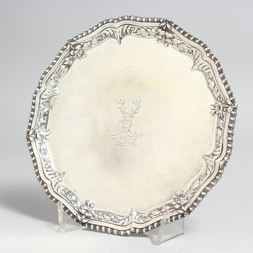 2041 - A GEORGE III SILVER CIRCULAR WAITER, 7ins diameter, with gadrooned edge, deer's head crest. London, ... 