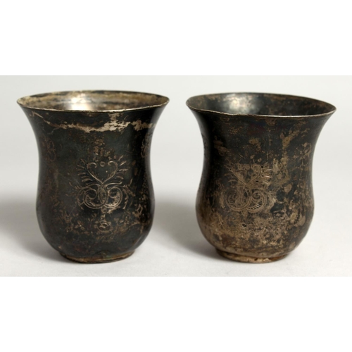 2047 - A  PAIR OF CONTINENTAL SILVER BEAKERS.