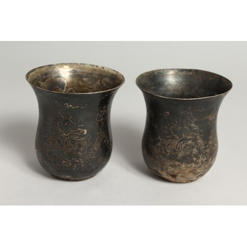 2047 - A  PAIR OF CONTINENTAL SILVER BEAKERS.