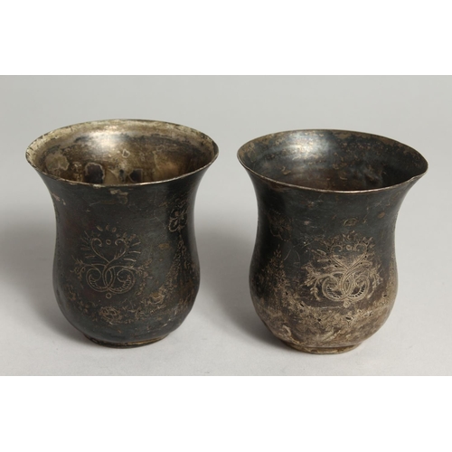 2047 - A  PAIR OF CONTINENTAL SILVER BEAKERS.