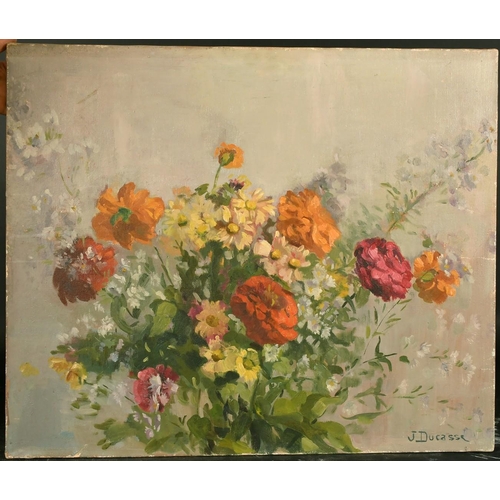 1054 - J. Ducasse, 20th Century French School, a still life study of flowers, oil on canvas, 21.25