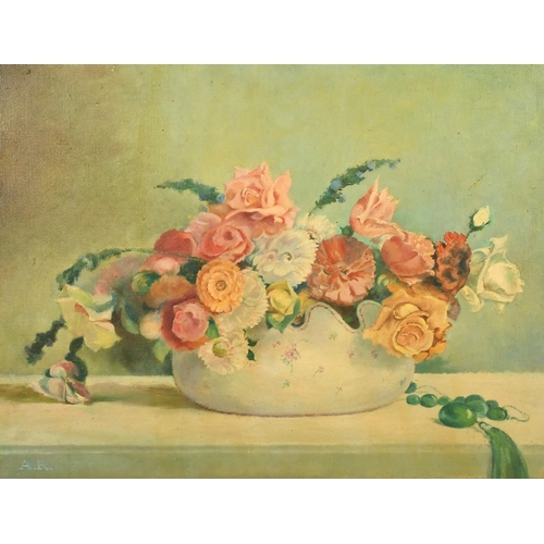 1066 - 20th Century French school, a still life of mixed flowers, oil on canvas, signed with initials, 19.7... 