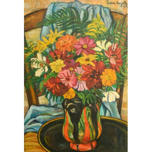 2050 - Pierre Noyelle, circa 1947, a still life of colourful flowers, oil on panel, signed, 21.5