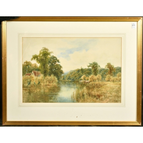 2271 - Wiggs Kinnaird (1870-1930) British, An extensive river landscape with a house and cattle at the wate... 