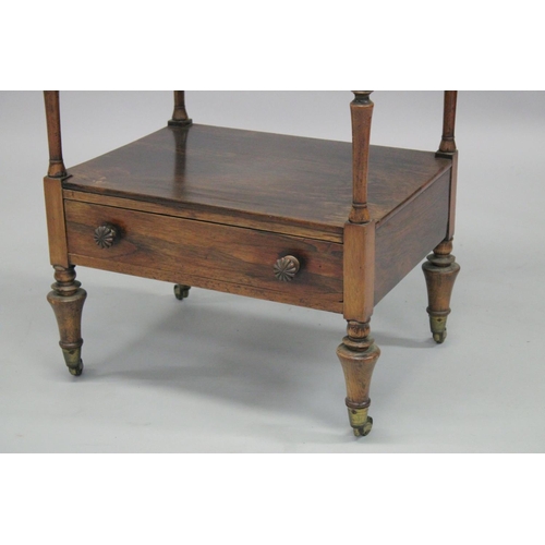 1001 - A GOOD 19TH CENTURY ROSEWOOD THREE TIER WHATNOT with carved finials, turned column support, a drawer... 