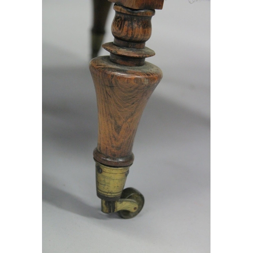 1001 - A GOOD 19TH CENTURY ROSEWOOD THREE TIER WHATNOT with carved finials, turned column support, a drawer... 