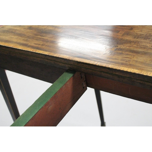 1002 - A GOOD GEORGE III MAHOGANY DEMI-LUNE FOLD OVER CARD TABLE with tapering legs. 2ft 6ins high x 3ft wi... 