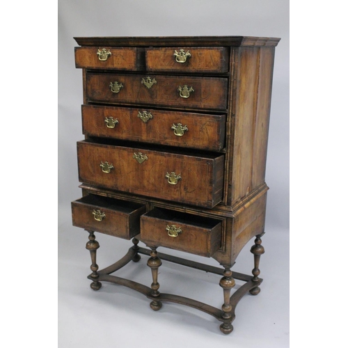 1005 - AN EARLY 17TH CENTURY CHEST ON STAND with a moulded cornice above two short and three graduated long... 