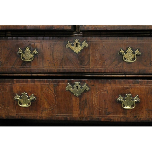 1005 - AN EARLY 17TH CENTURY CHEST ON STAND with a moulded cornice above two short and three graduated long... 