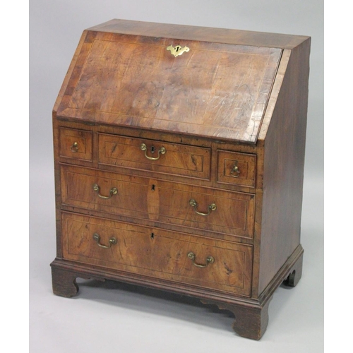 1006 - AN 18TH CENTURY WALNUT FALL FRONT BUREAU with a fitted interior, three small drawers above two gradu... 