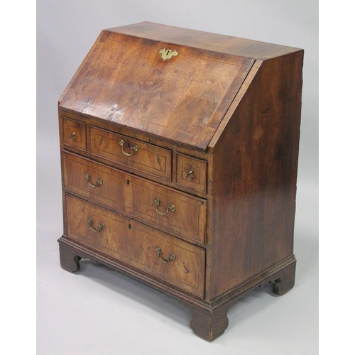 1006 - AN 18TH CENTURY WALNUT FALL FRONT BUREAU with a fitted interior, three small drawers above two gradu... 