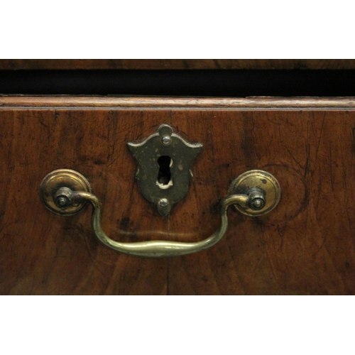 1008 - AN 18TH CENTURY WALNUT CHEST OF DRAWERS with a plain 