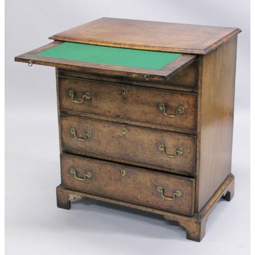 1009 - A GOOD 18TH CENTURY STYLE WALNUT CHEST OF DRAWERS with a moulded top, brushing slide, two short and ... 