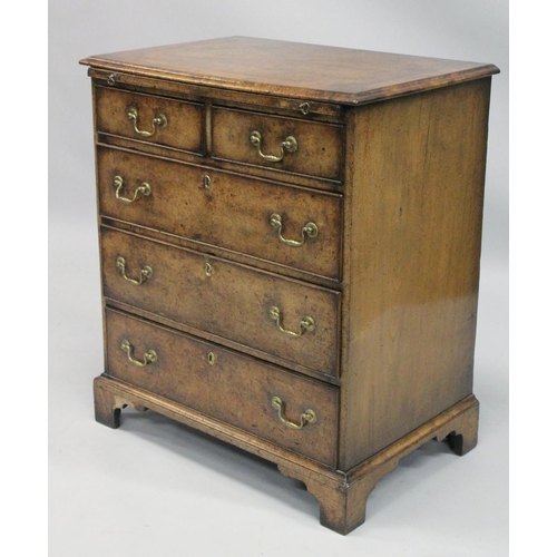 1009 - A GOOD 18TH CENTURY STYLE WALNUT CHEST OF DRAWERS with a moulded top, brushing slide, two short and ... 