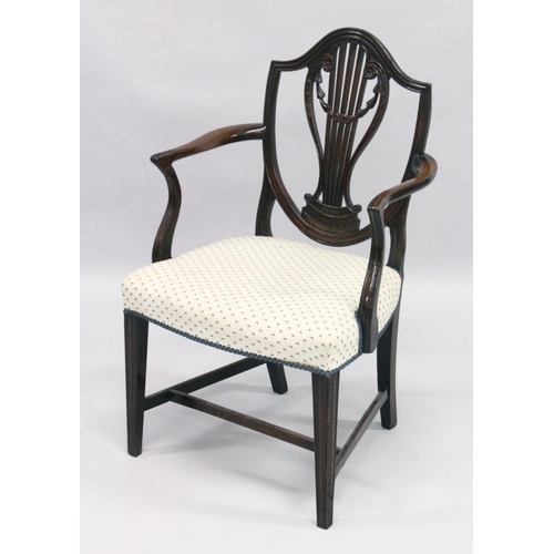 1013 - A GOOD HEPPLEWHITE MAHOGANY SHIELD BACK CHAIR with pierced vase splat, padded seat on square taperin... 