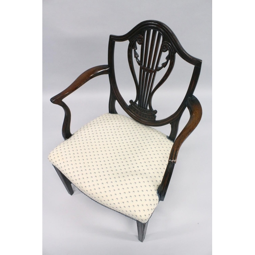 1013 - A GOOD HEPPLEWHITE MAHOGANY SHIELD BACK CHAIR with pierced vase splat, padded seat on square taperin... 