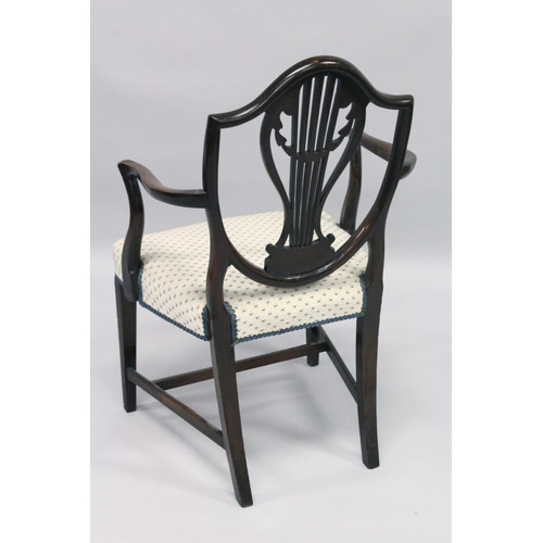 1013 - A GOOD HEPPLEWHITE MAHOGANY SHIELD BACK CHAIR with pierced vase splat, padded seat on square taperin... 