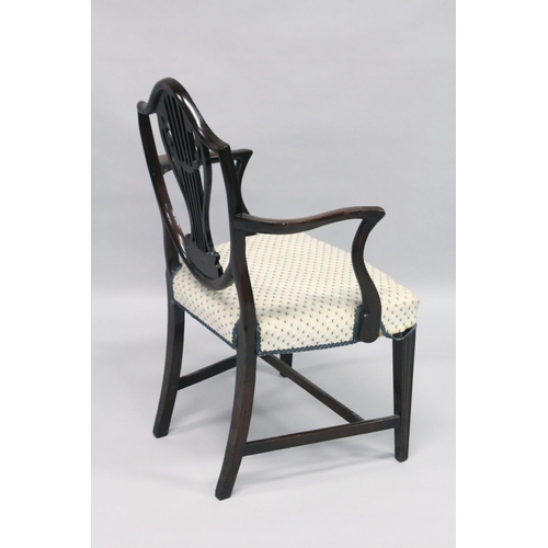 1013 - A GOOD HEPPLEWHITE MAHOGANY SHIELD BACK CHAIR with pierced vase splat, padded seat on square taperin... 